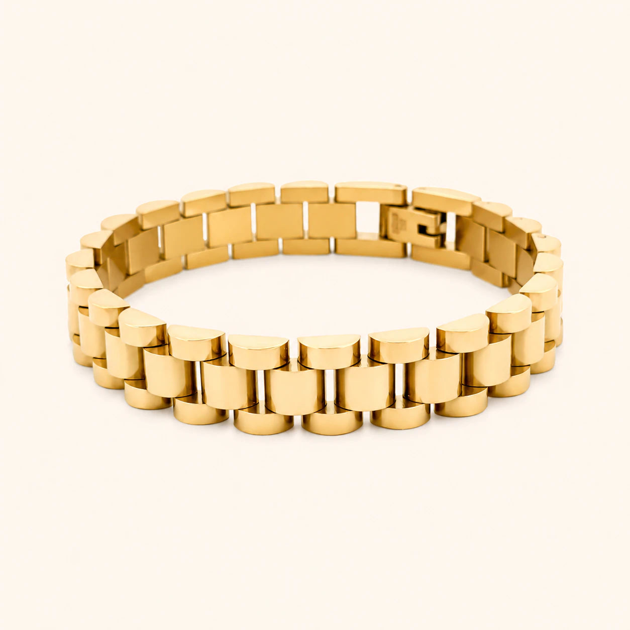 Gold bracelet on a white background